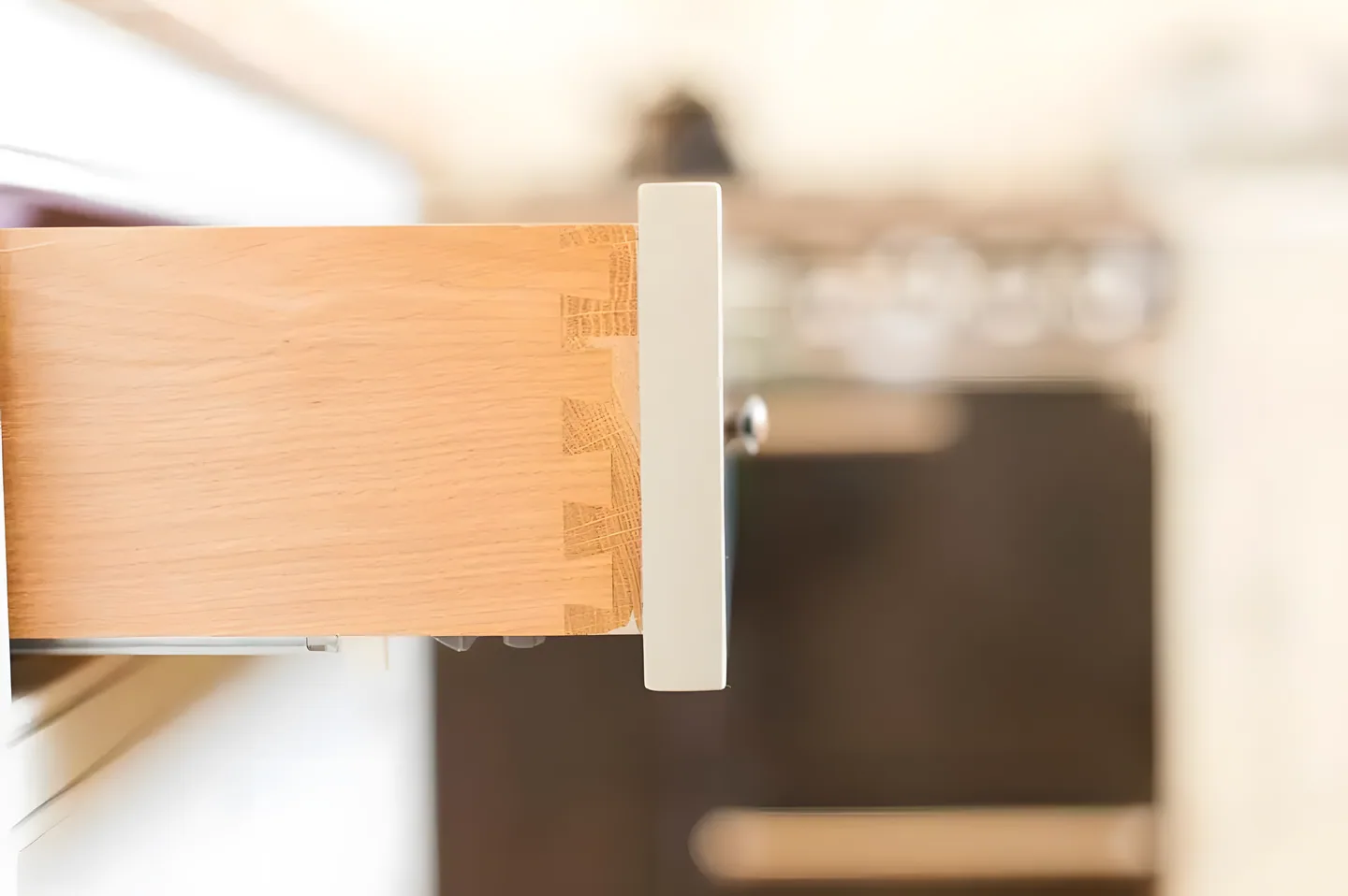 Close-up of a dovetailed oak drawer corner