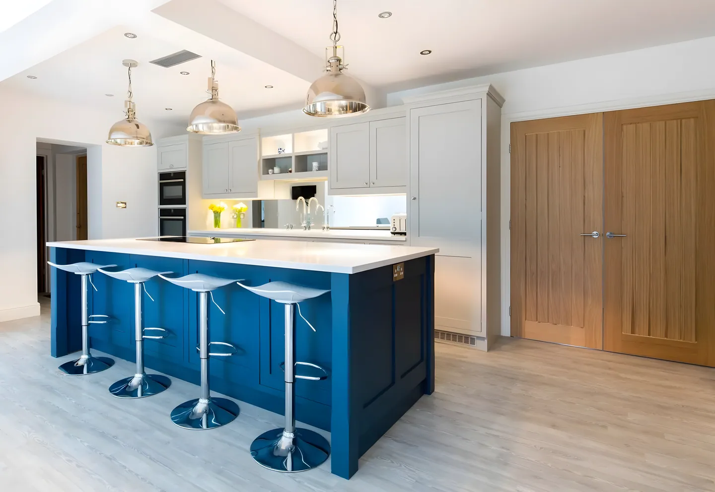 A cobalt blue hand painted kitchen island