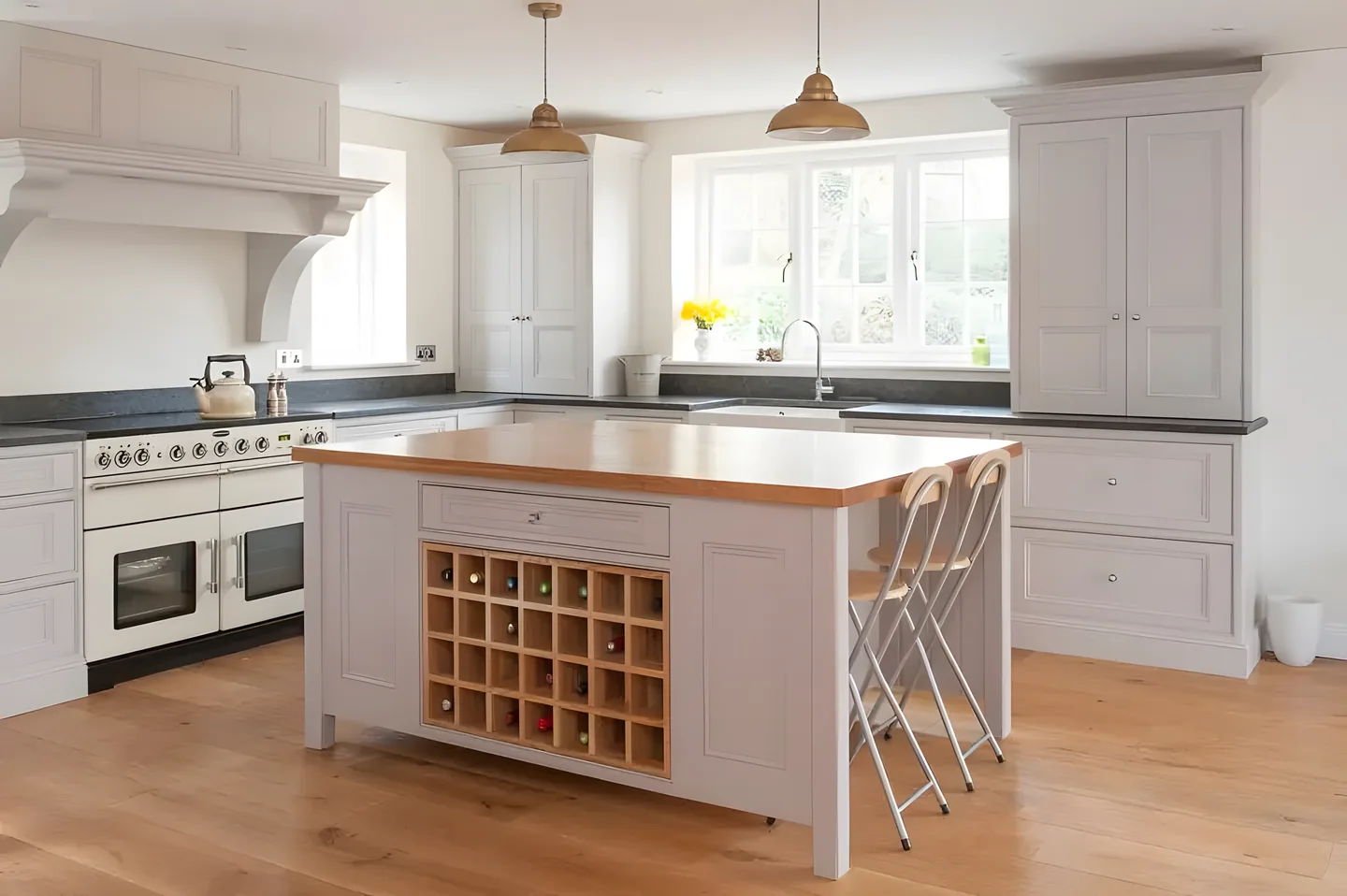 A painted island with an oak top and wine rack